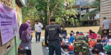 Gandeng Sejumlah Lembaga, ‘Aisyiyah Sumut Gembirakan Warga Korban Banjir di Bantaran Sungai Deli