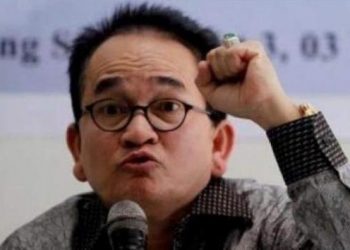 Posting Anies Pakai Baju Adat Suku Dani Papua, Ruhut Sitompul Dipolisikan