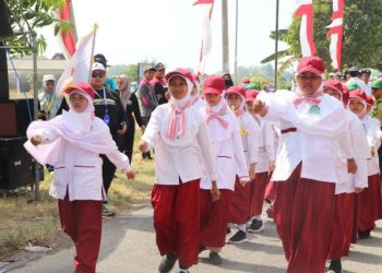 Gerak Jalan HUT RI, SD Muhammadiyah 2 Plus Palang Bawa Semangat “Terus Melaju Untuk Indonesia Maju”