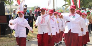 Gerak Jalan HUT RI, SD Muhammadiyah 2 Plus Palang Bawa Semangat “Terus Melaju Untuk Indonesia Maju”