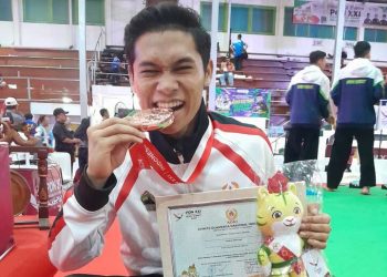 Guru SMP Muhammadiyah PK Kottabarat Solo Sabet Medali Perunggu Pencak Silat PON XXI Aceh~Sumut