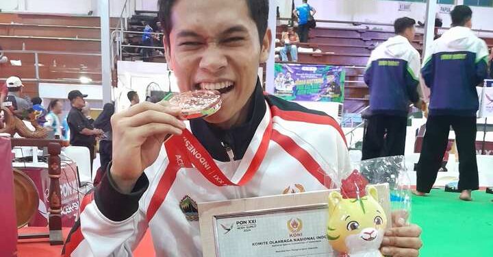 Guru SMP Muhammadiyah PK Kottabarat Solo Sabet Medali Perunggu Pencak Silat PON XXI Aceh~Sumut