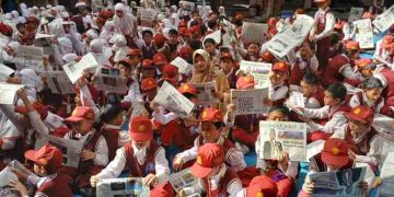 Milad Ke-113 Muhammadiyah, SD Muhammadiyah 1 Solo Gerakan Literasi Baca Koran secara Massal