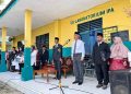 Meskipun Diguyur Hujan, Upacara Hari Guru Nasional 2025 Perguruan Muhammadiyah Lubuk Pakam Tetap Khidmat 