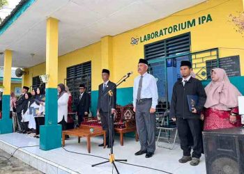 Meskipun Diguyur Hujan, Upacara Hari Guru Nasional 2025 Perguruan Muhammadiyah Lubuk Pakam Tetap Khidmat 