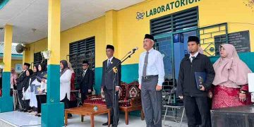 Meskipun Diguyur Hujan, Upacara Hari Guru Nasional 2025 Perguruan Muhammadiyah Lubuk Pakam Tetap Khidmat 